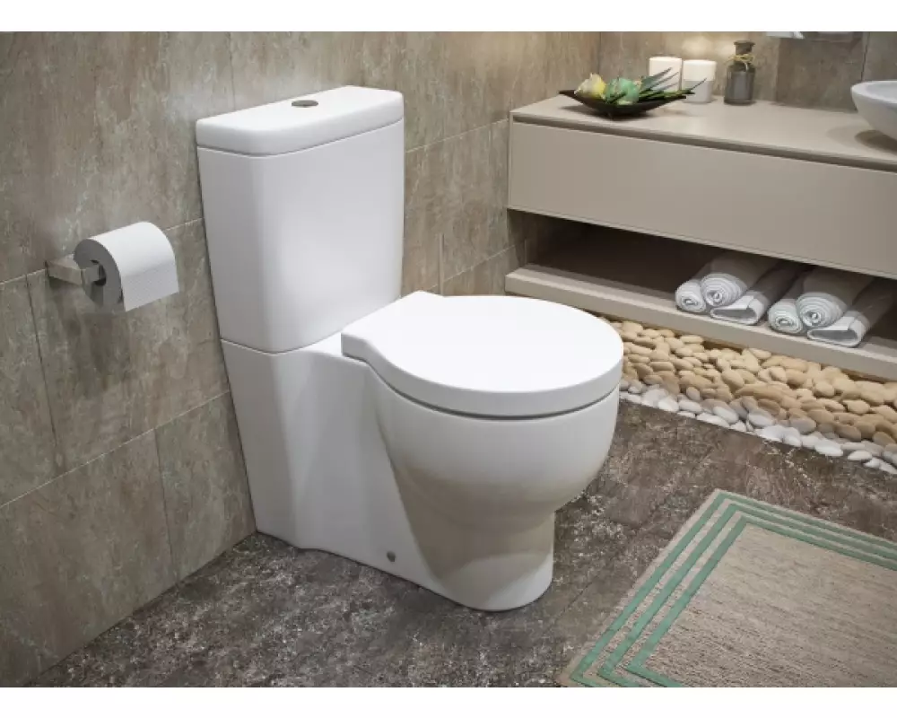 Безободковый унитаз компакт «ОЛИМП» (универсальный монтаж: в пол,прямой,косой )